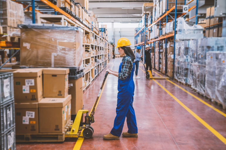 Warehouse employees working with boxes