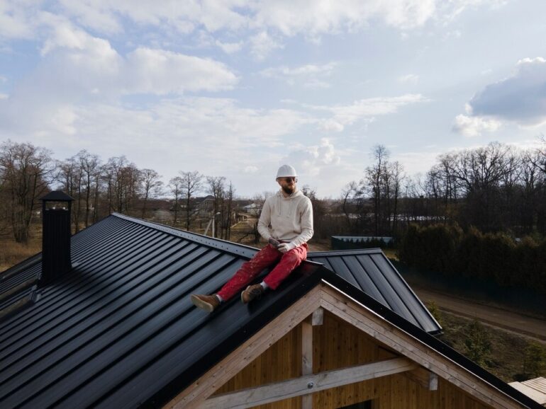 men on roof prepair for maintenance