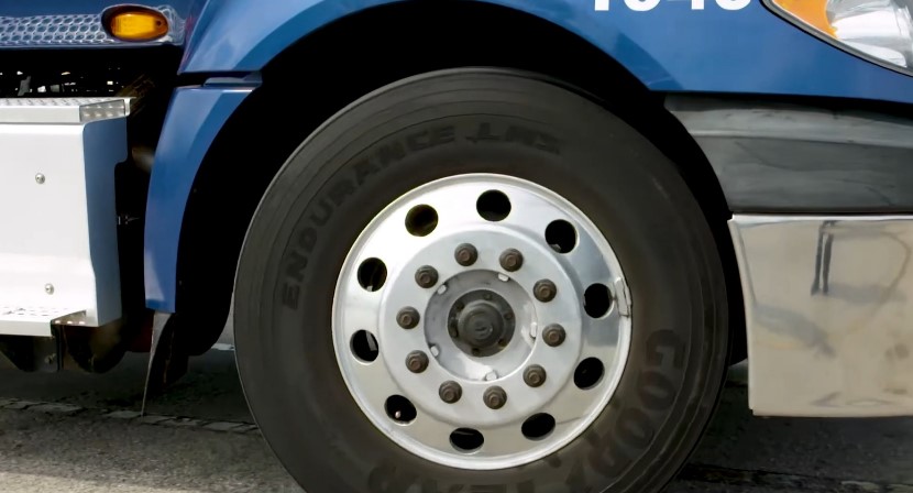 A close up photo of a truck's tire