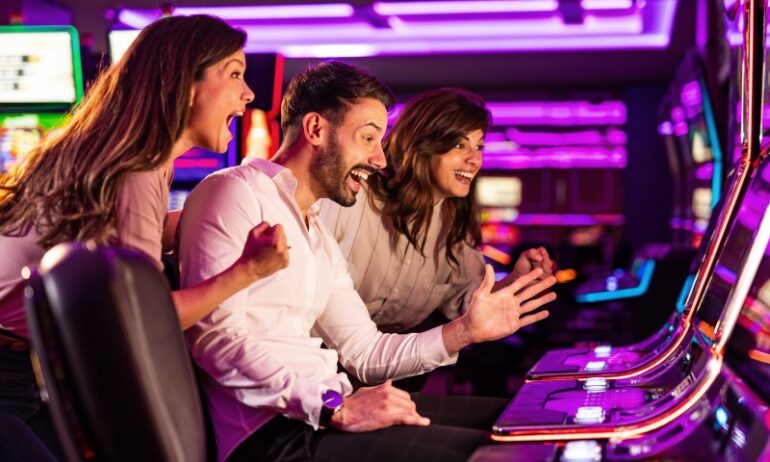 group of friends having fun in casino