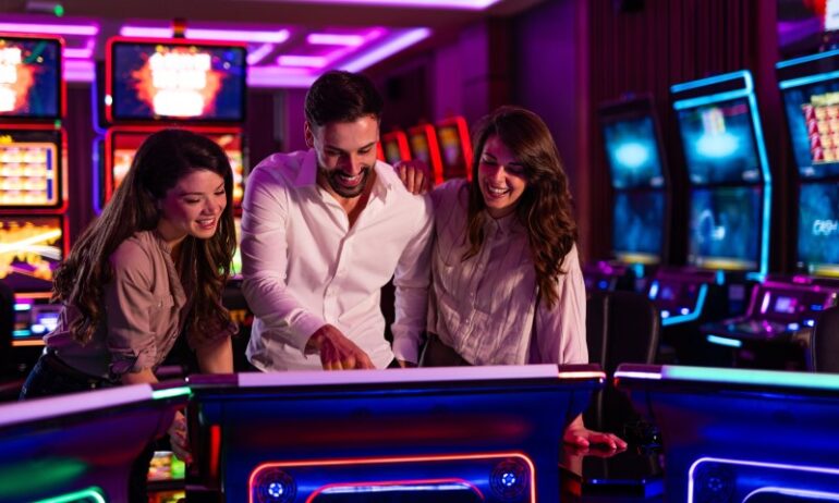 group of friends choosing a game in casino