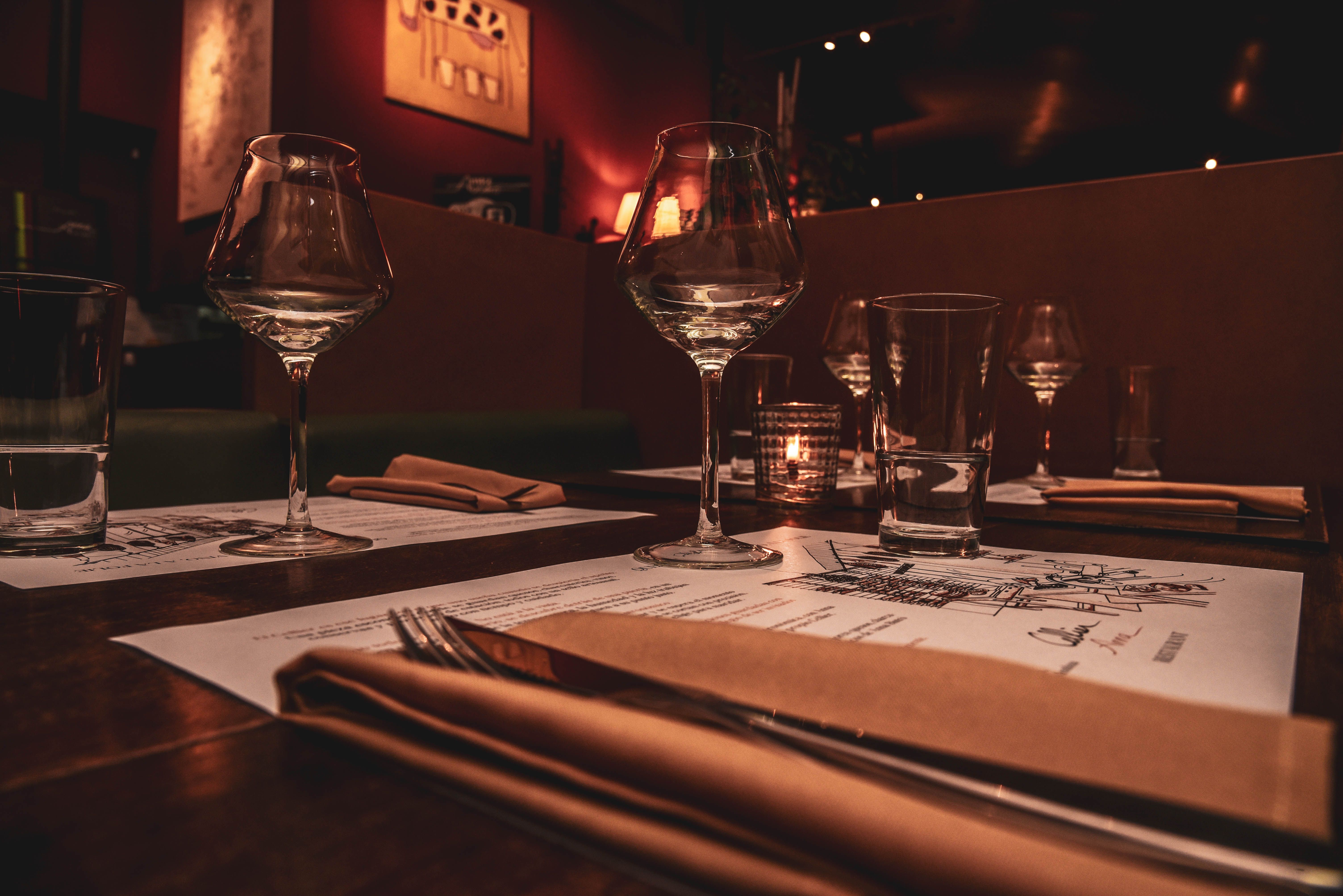 Candlelit elegant restaurant table setting representing Munich fine dining