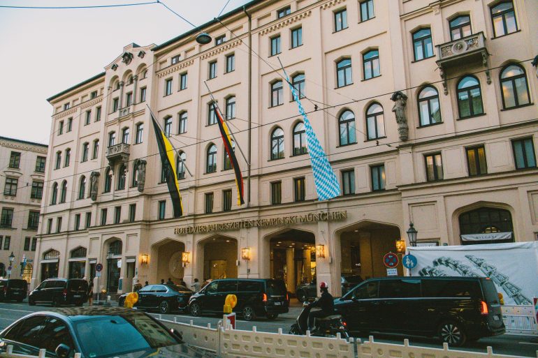 Hotel Vier Jahreszeiten Kempinski on Munich's Maximilianstrasse illuminated in the evening